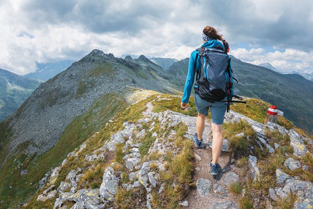woman hiking to illustrate taking time out