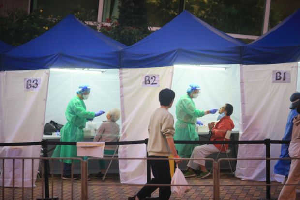 Hong Kong- March 9 2022 under the 5th outbreak of Omicron, residents are forced to examine in mobile specimen collection station