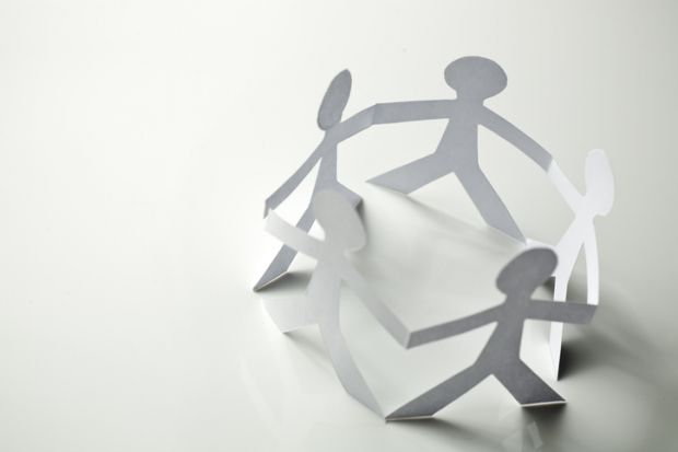 Paper people in a circle, symbolising human connection