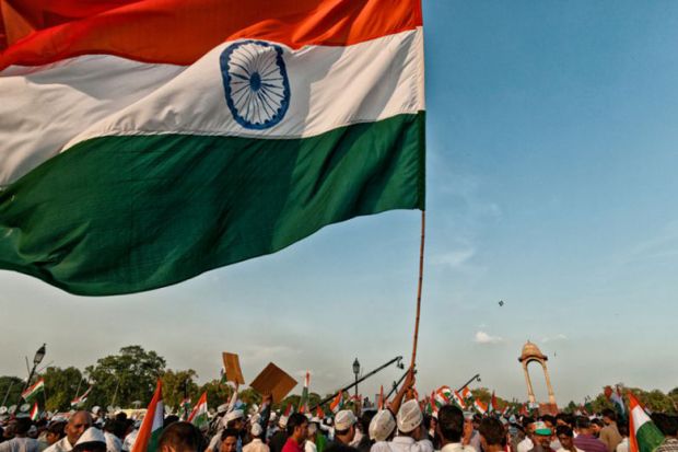 Indian flag being waved by demonstrators during protest