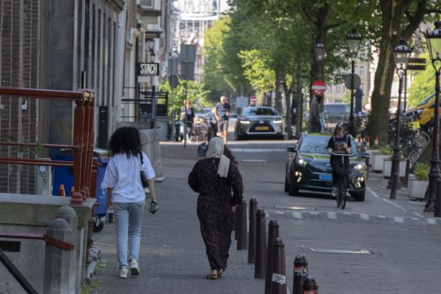 Islamic Woman Walking At Amsterdam The Netherlands