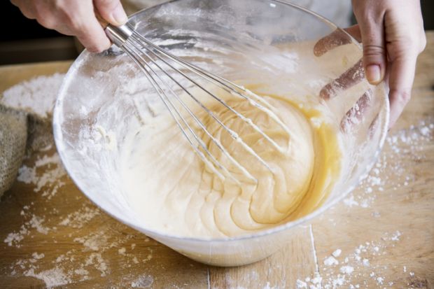 Whisk is used to mix something in a glass bowl