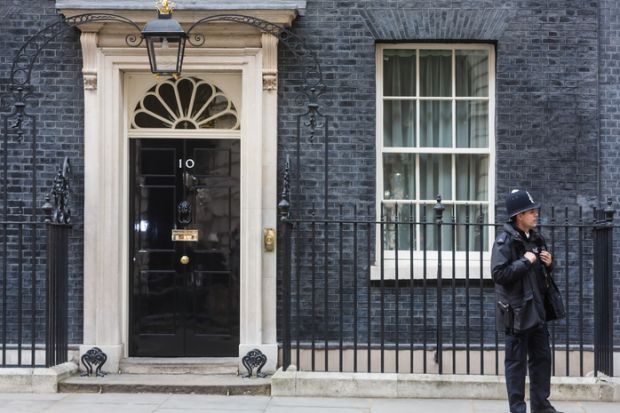 A police officer outside No.10 Downing Street, London