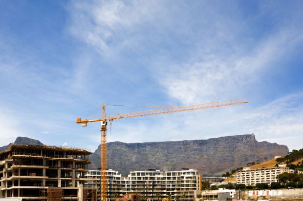 Table Mountain behind a construction site in Cape Town, South Africa