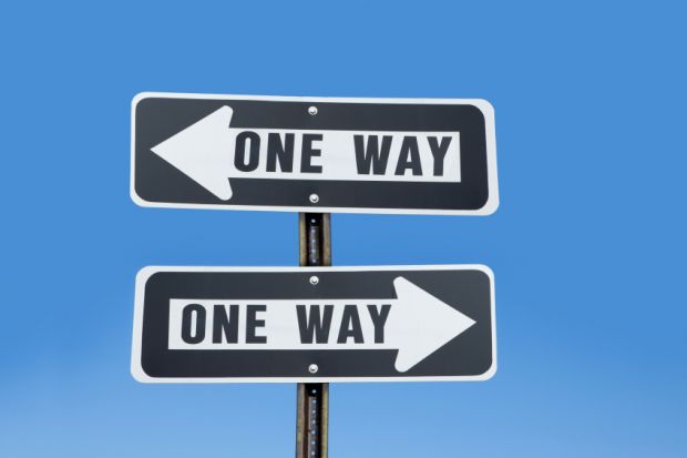 'One way' signs pointing in two directions