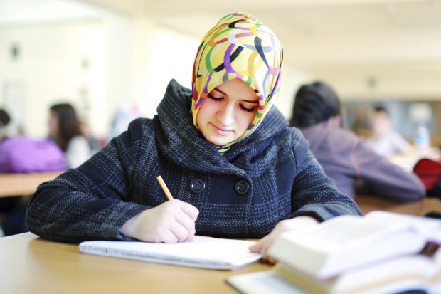 Student with head scarf