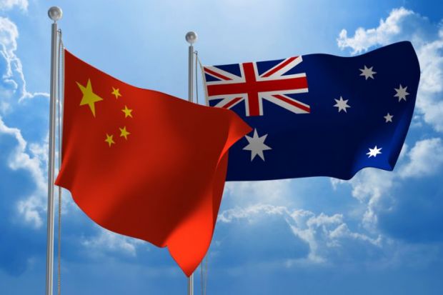 Chinese and Australian flags flying
