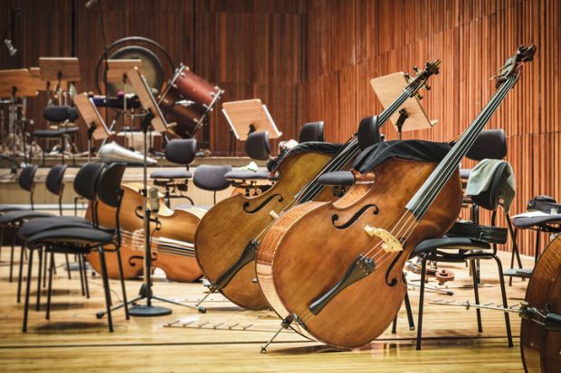 Cellos in an empty auditorium