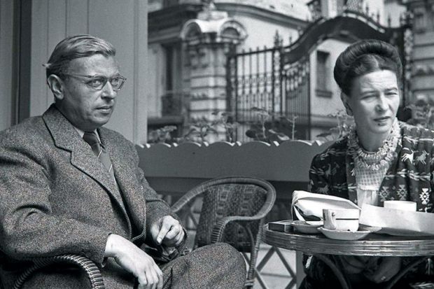 Jean-Paul Sartre and Simone de Beauvoir meeting over coffee