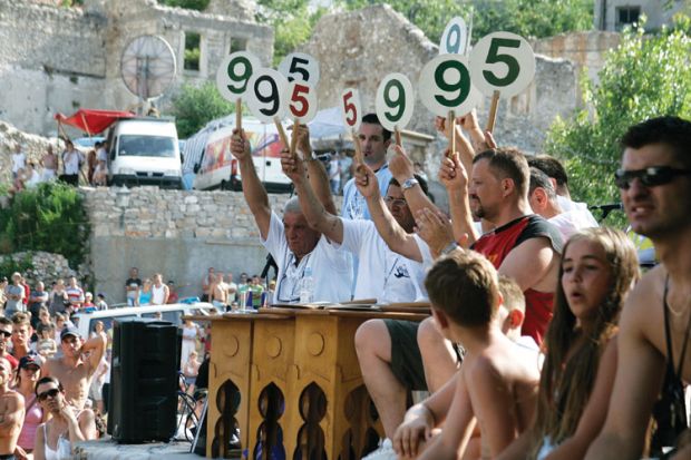 Judges scoring bridge jumping contest, Mostar, Bosnia