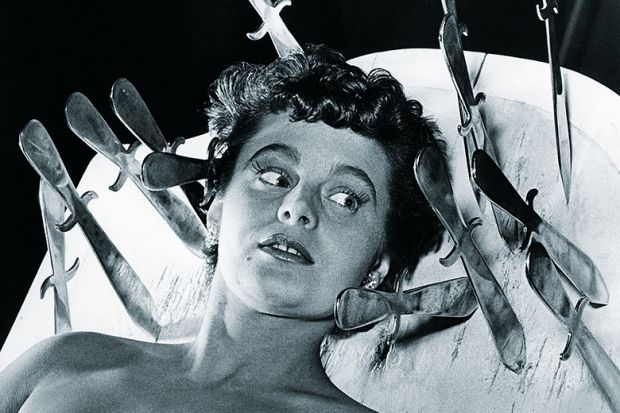 Woman with knives around her head