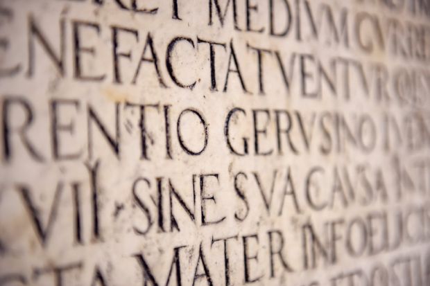 Latin inscription on wall