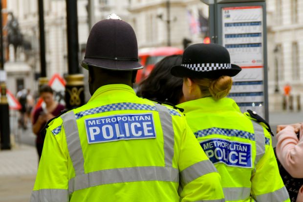 London, England, UK - 27 June 2023 Two police officers of the Metropolitan Police on patrol in central London.