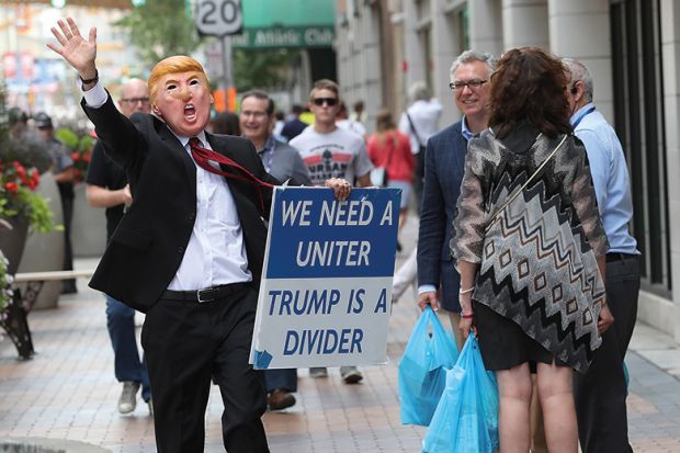 Man in Trump mask
