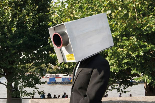 A man with a CCTV camera on his head