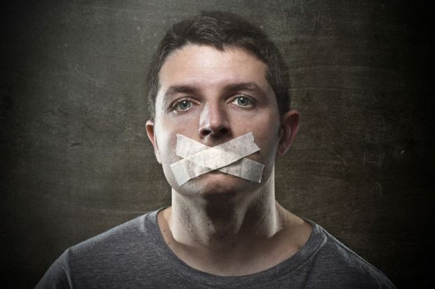 Man with tape covering mouth