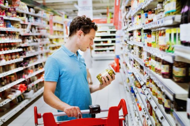 Man choosing in supermarket