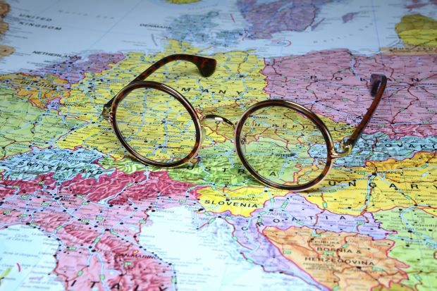 Glasses resting on a map