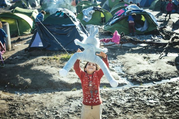 Child playing in refugee camp