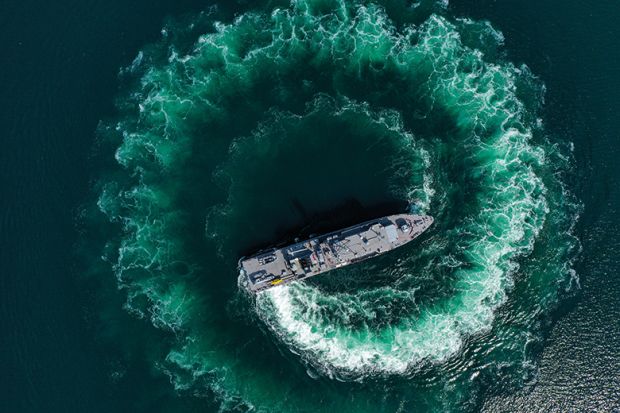  An aerial view of Turkish Navy minesweeper ship standing by against the threat of mines drifting in the Black Sea due to the Russia-Ukraine war. To illustrate navigating geopolitical tensions