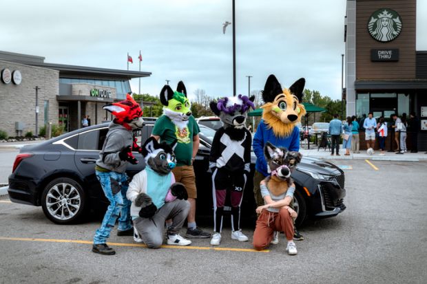 On Route 401 East. This photo was taken on September the 4th of 2022 on the way to Kingston city on highway 401. The performers in the costumes were posing in front of their car.