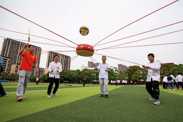 Students play stress relief games in Hai’an City, Jiangsu Province, China