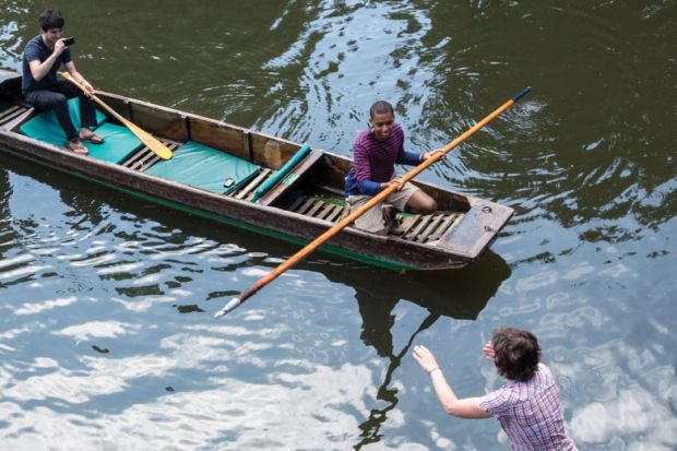 People on boats punting on River Cam, Cambridge