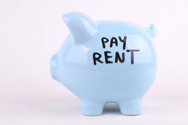 Piggy bank saying 'pay rent'