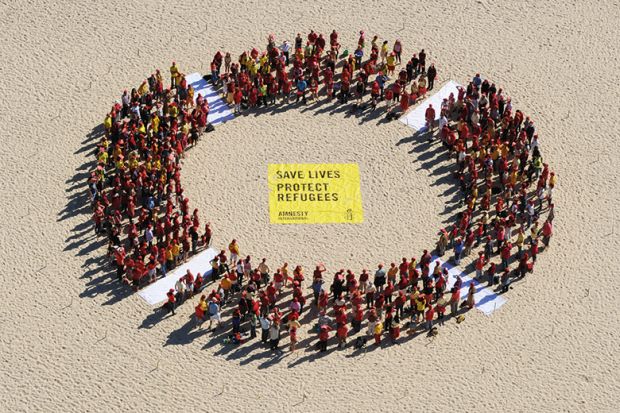 Protesters form giant circle on Bondi Beach, Australia