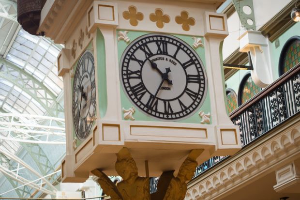 Queen Victoria Building, Sydney, Australia - May 14 2022  Lower section of the iconic Royal Clock with its distinctive black lined circle clock-face and Roman numerals framed by a light green square.