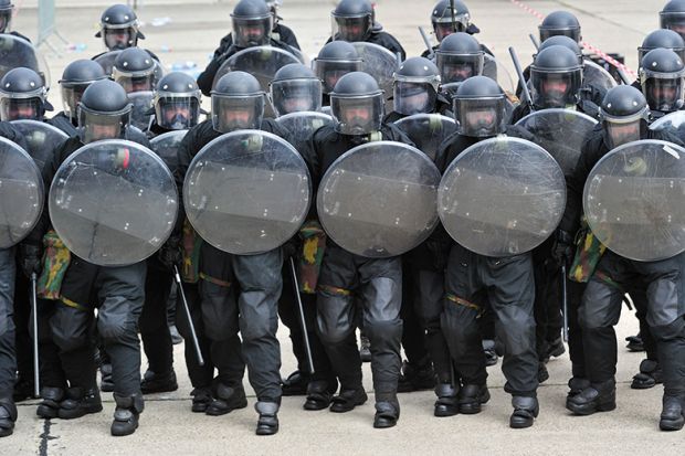 Riot police with shields