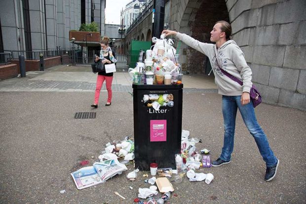 rubbish-pile-on-bin