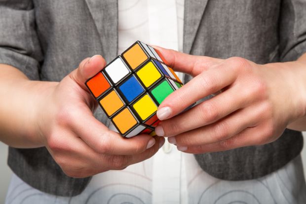 Rubik's Cube puzzle illustrating article about changes to students loans system in the UK