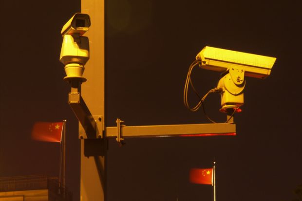 Security cameras are a symbol of modern surveillance, much of which goes unseen. These are located on The Bund, Shanghai.