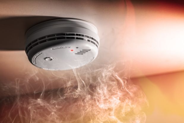 A smoke detector, symbolising the detection of cheating