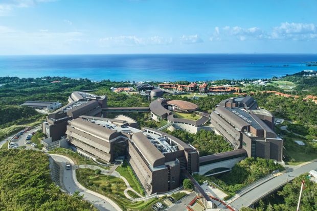 OIST campus building seen from a bird's-eye view to illustrate Funding woes cast doubt on future of pioneering Japanese campus