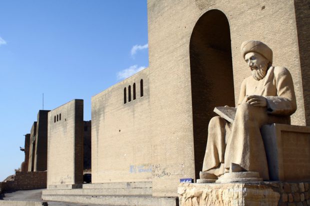 Statue of Kurdish poet outside Citadel of Erbil