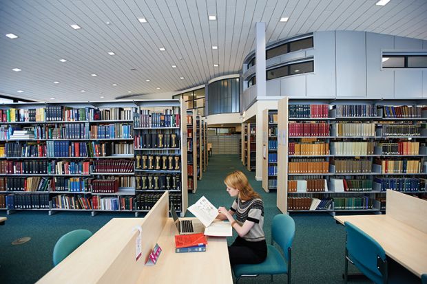 Student studying in library