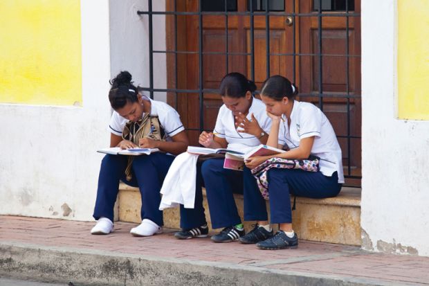 Students at work, Getsamani old town, Cartagena, Colombia