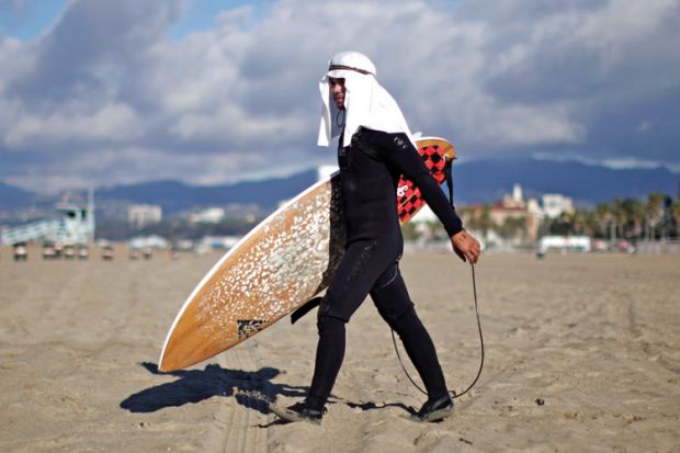 Surfer at Halloween surf contest, Santa Monica, Los Angeles, California