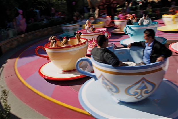 Guests ride the Tea Cups at Walt Disney Co.’s Disneyland Park in Anaheim, California
