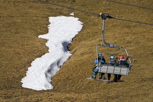 ski lift in a snowless landscape
