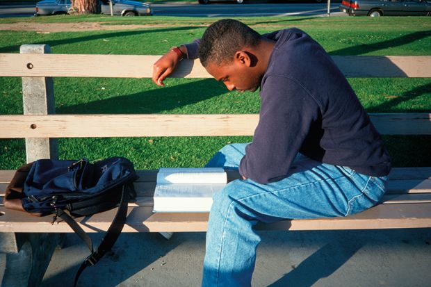 Black student on bench