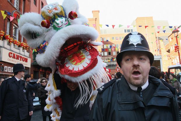 British policeman with Chinese dragon