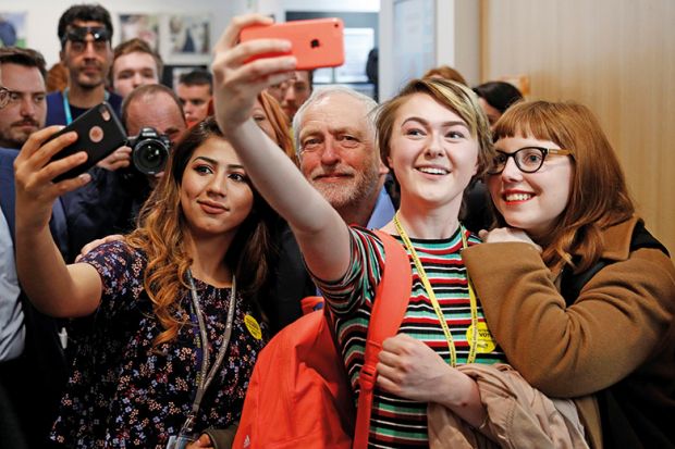 Jeremy Corbyn, the leader of Britain's opposition Labour Party, poses for selfies at a campaign event in Leeds, May 10, 2017