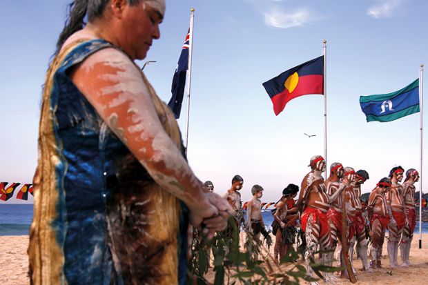 Traditonally dressed Australian Aboriginal performers participate in a ‘Corroboree’