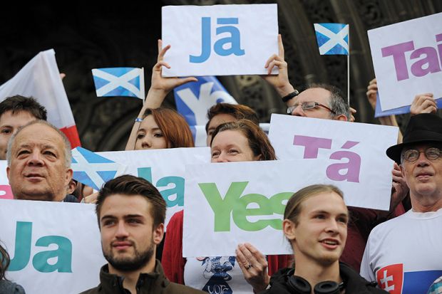Leaflets with the word 'Yes' written in different languages are displayed. Scottish referendum, 2014.