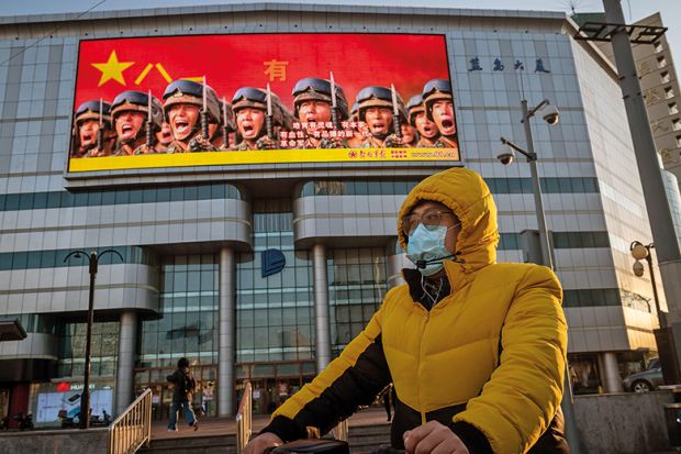 Man wearing a facemask in Beijing, China