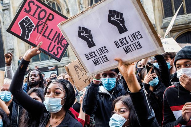 Photo of protesters in Oxford holding Black Lives Matter placards