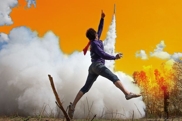 Person jumping in the air as a rocket takes off